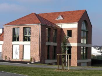 Nelskamp dakpan op woning Nelskamp dakpan op woning