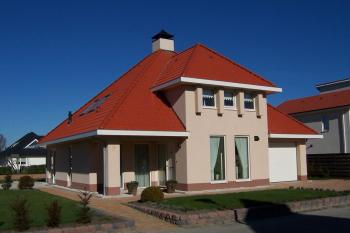 Nelskamp dakpan op woning Nelskamp dakpan op woning