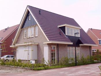 Nelskamp dakpan op woning Nelskamp dakpan op woning