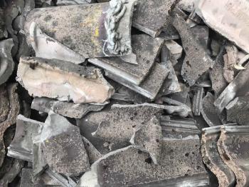 Nieuw dak met Wienerberger Madura wijnrood verglaasde dakpannen in Dendermonde