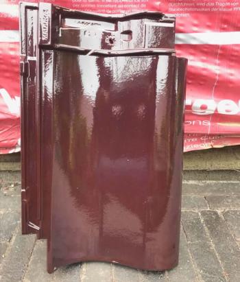Nieuw dak met Wienerberger Madura wijnrood verglaasde dakpannen in Dendermonde