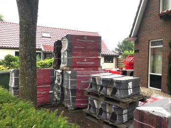 Nieuw dak met Wienerberger Madura wijnrood verglaasde dakpannen in Dendermonde